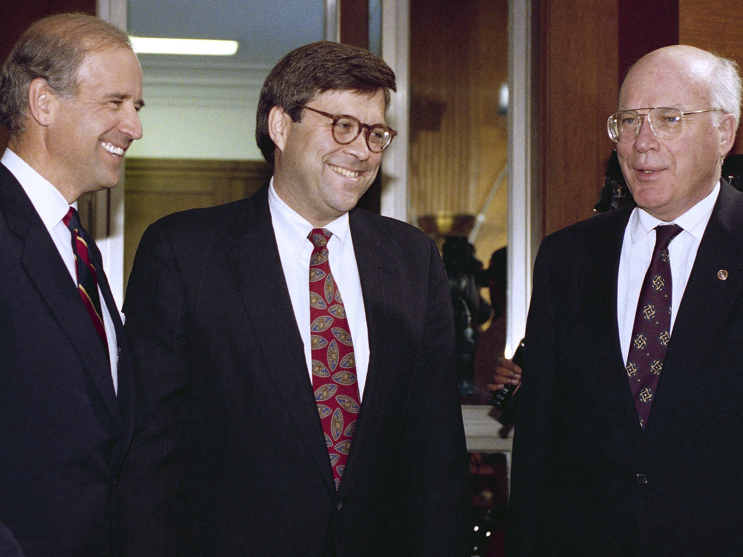 Attorney General nominee William Barr (center) chats with then-Sen. Joe  Biden and Sen. Patrick Leahy, D-Vt., before Barr's hearing on Nov. 12,  1991. - WJCT