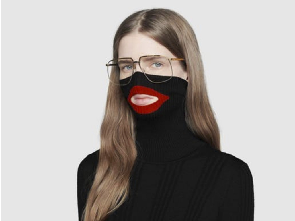 A screenshot showing Gucci's black turtleneck sweater before the luxury brand pulled it from its online and physical stores. Gucci apologized complaints the garment resembled "blackface." - WJCT Public Media