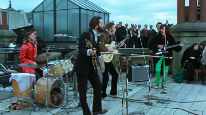 The Beatles performing a rooftop concert
