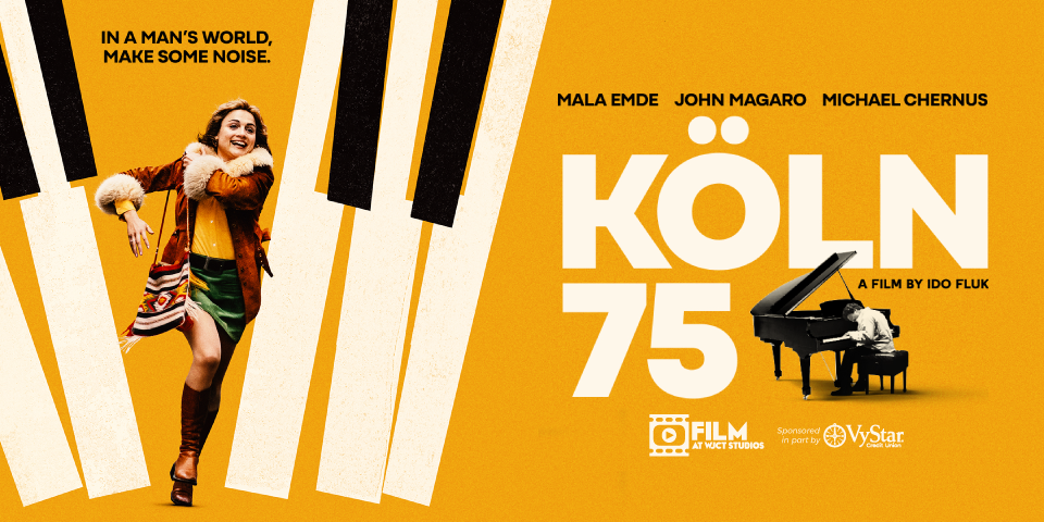 A promotional image for the film "KÖLN 75," featuring a woman dancing joyfully in a colorful outfit, with a grand piano and a man playing in the background. The poster includes the tagline "IN A MAN'S WORLD, MAKE SOME NOISE" and lists sponsor VyStar Credit Union.
